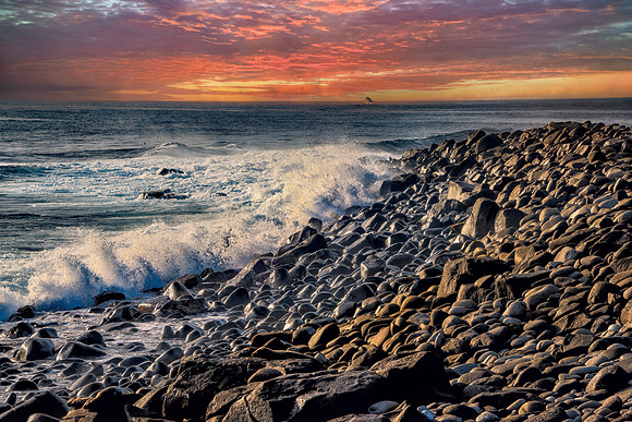Alpenglow Illumates Rocky Shore