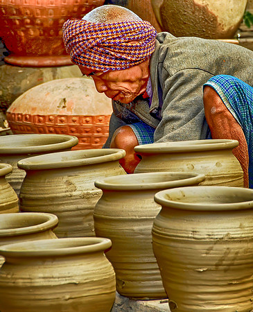A Man Among His Pots Burma 261