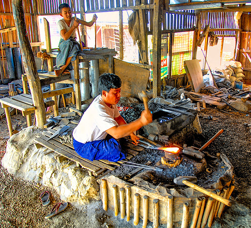 Action At the Blacksmith Shop Inle Lake Burma 26
